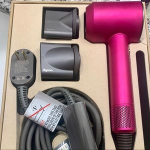Open box…brand new…Dyson blow dryer…bought it and never used.